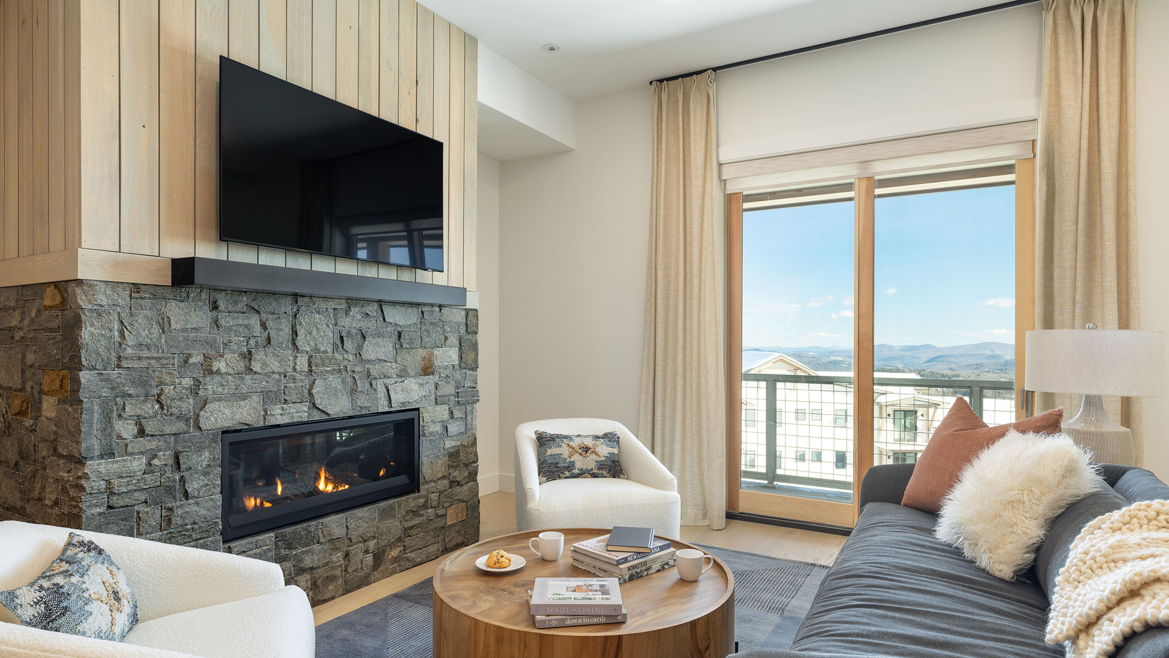 Living room with fireplace at SouthFace Village